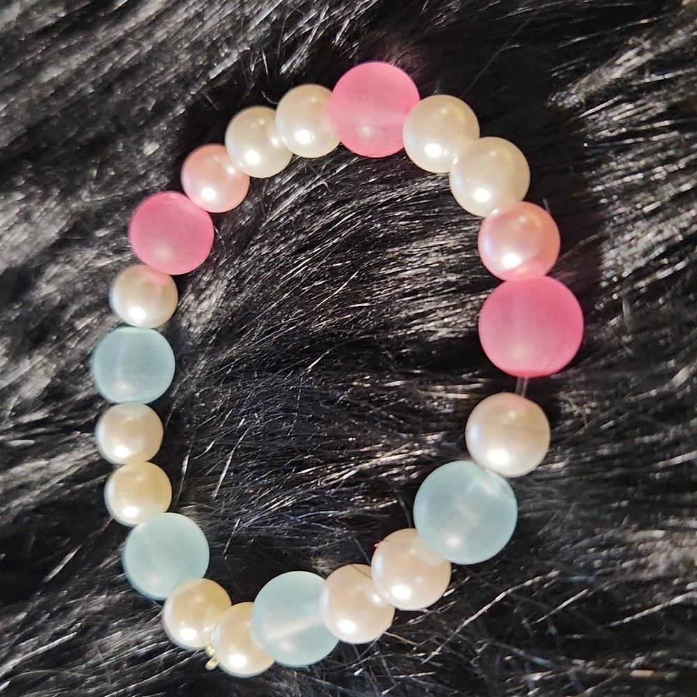 Handcrafted beaded bracelet made on a stretchy cord